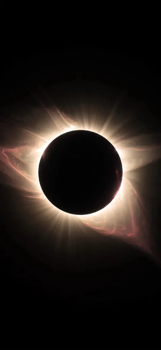 Total solar eclipse with glowing white corona against a black sky