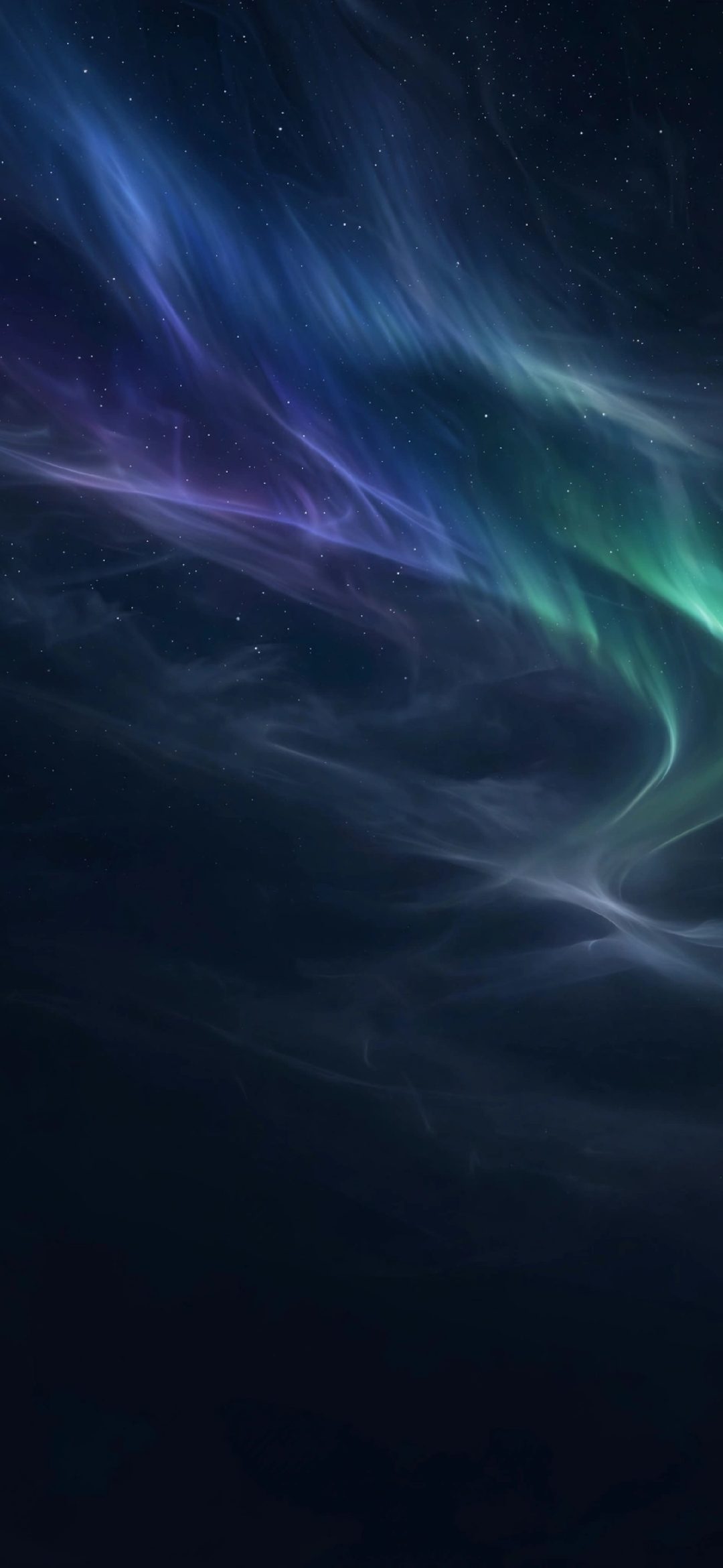 Blue, violet and green aurora lights across a dark starry night sky