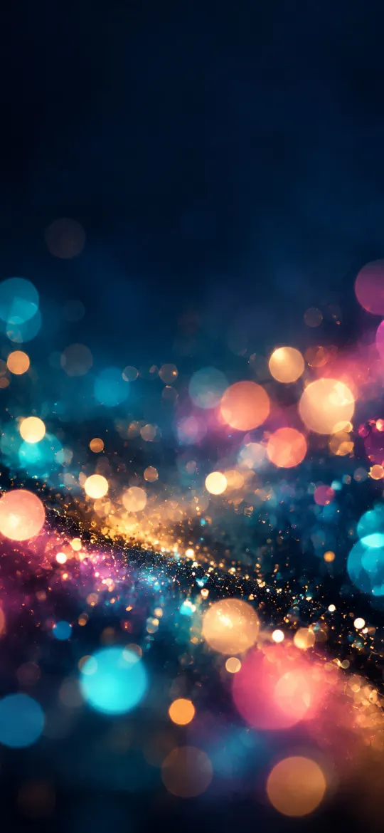 Glowing pink, teal and gold bokeh lights with sparkles on a dark navy background