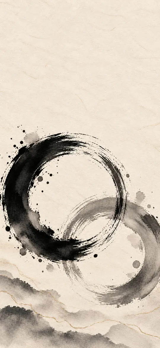 Two overlapping black and grey enso circles on cream paper