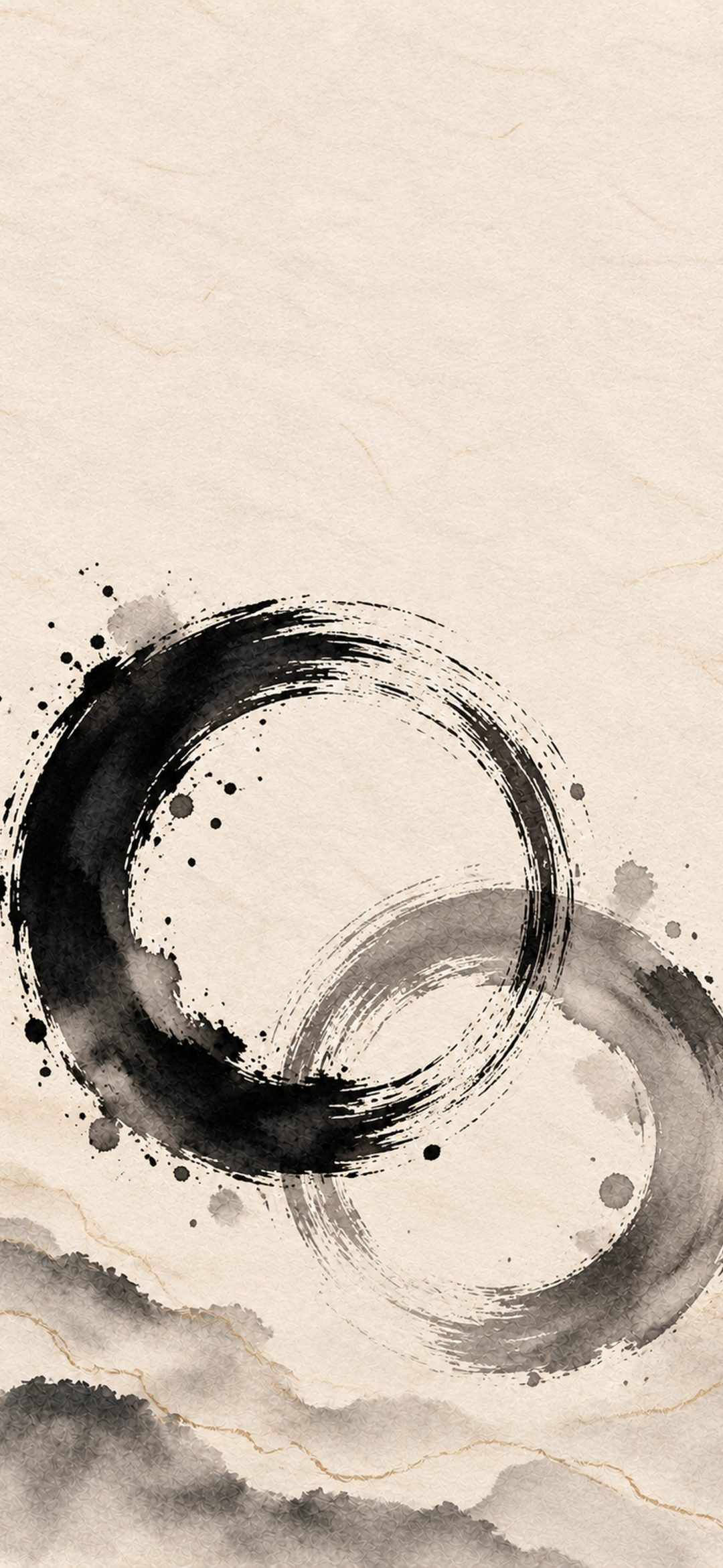 Two overlapping black and grey enso circles on cream paper
