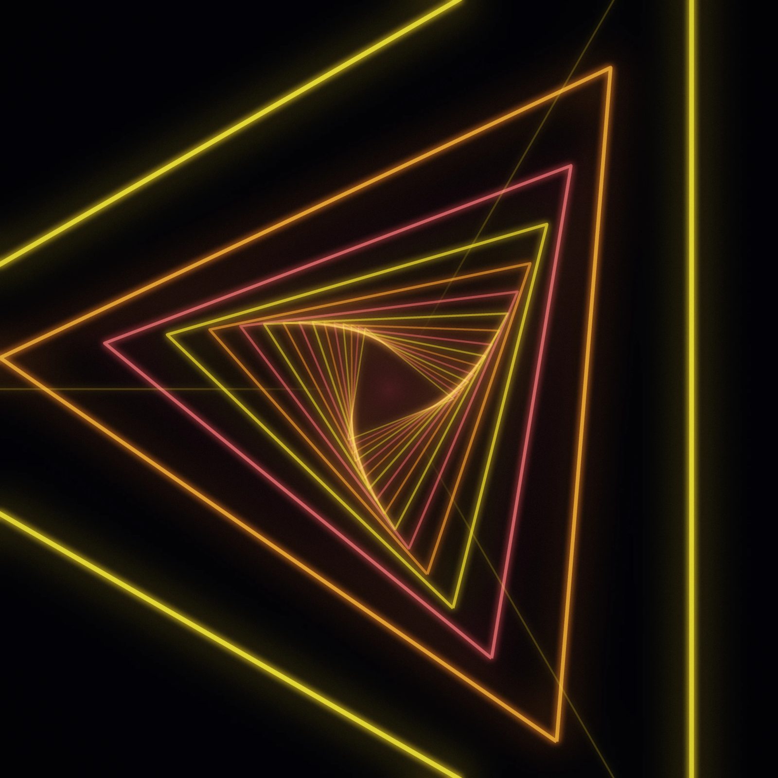 Amber Prism Tunnel: yellow, orange and red neon triangles rotate as they fall away into the dark, forming a glowing triangular tunnel, iPad wallpaper