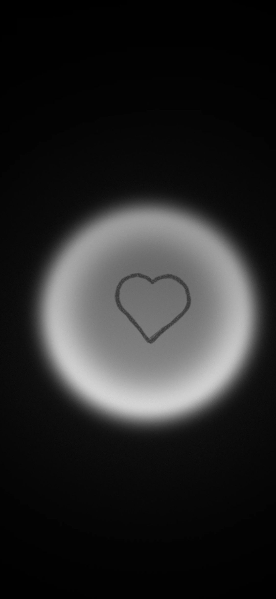 Chalk Heart Halo Ring: a white chalk-outline heart sits in the centre of a glowing white ring on a black background, iPhone wallpaper