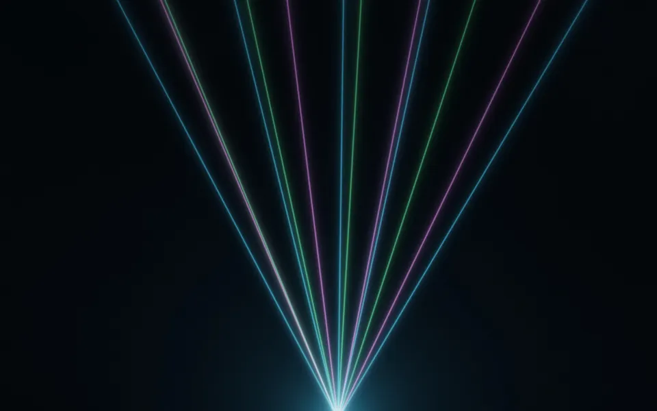 Club Beam Spectrum: a wide fan of blue, green and pink laser beams spreads across hazy darkness from a single glowing source below, Mac wallpaper