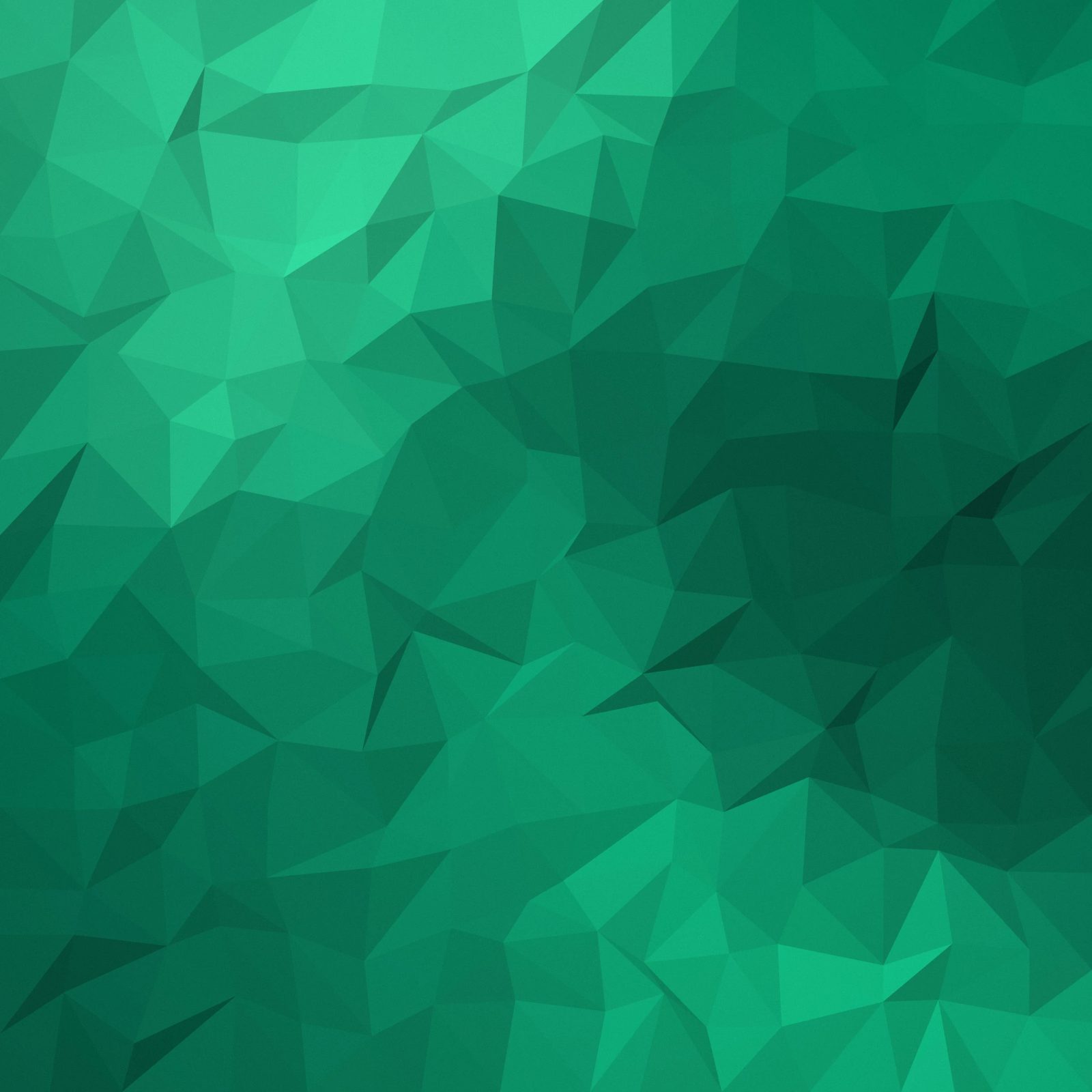 Emerald Facets: emerald and jade triangles form a faceted surface, each one shaded as if lit from the top left, iPad wallpaper
