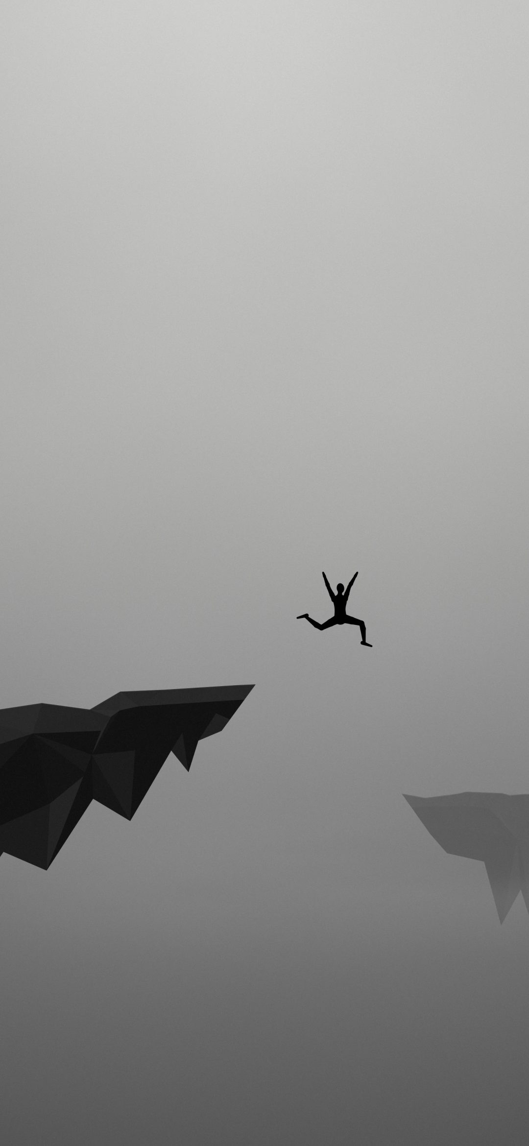 Leap of Faith in Grey: a small silhouetted figure leaps off a dark faceted cliff into a soft grey sky, with a far cliff fading in the haze, iPhone wallpaper