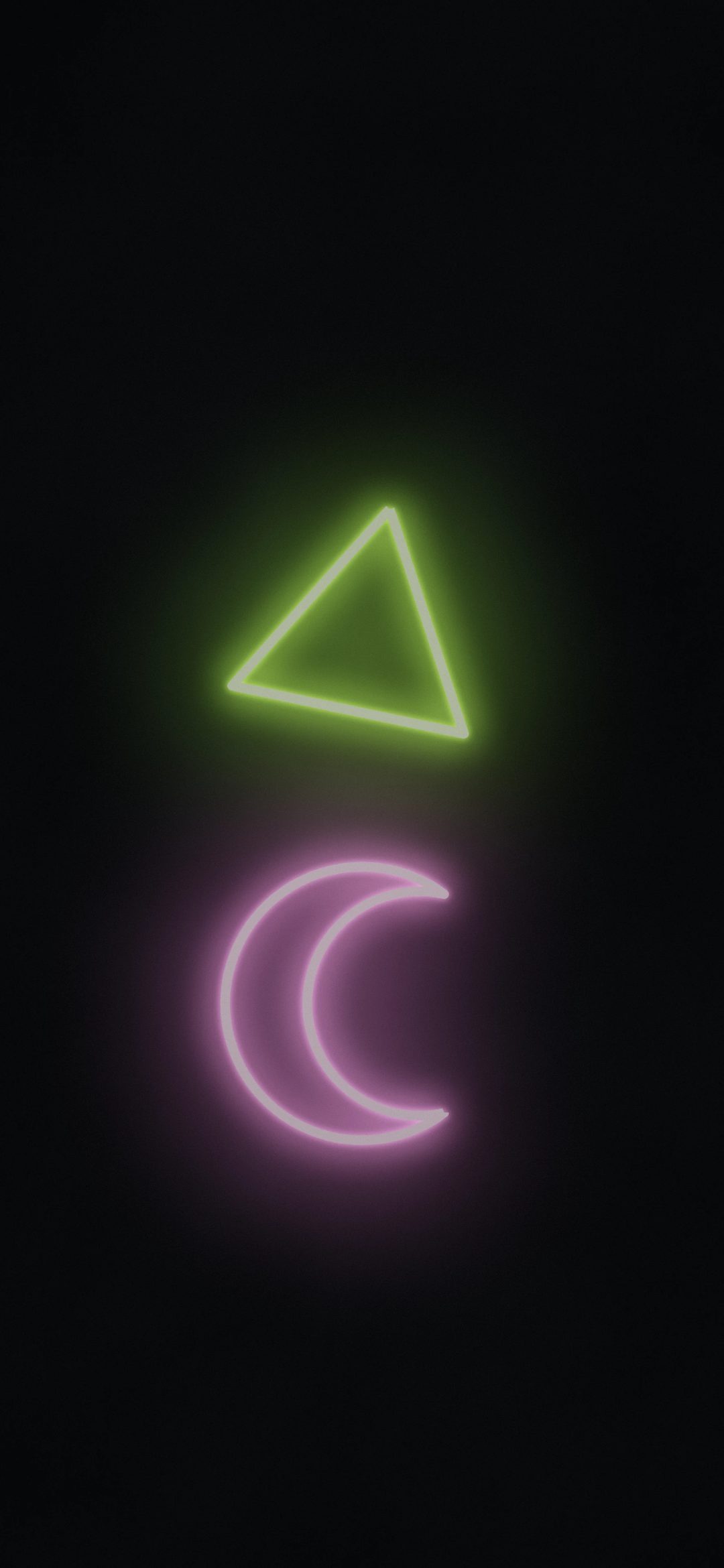 Lime Moon Signs: a lime green neon triangle and a pink crescent moon glow on a dark wall, two simple signs lighting up the night, iPhone wallpaper