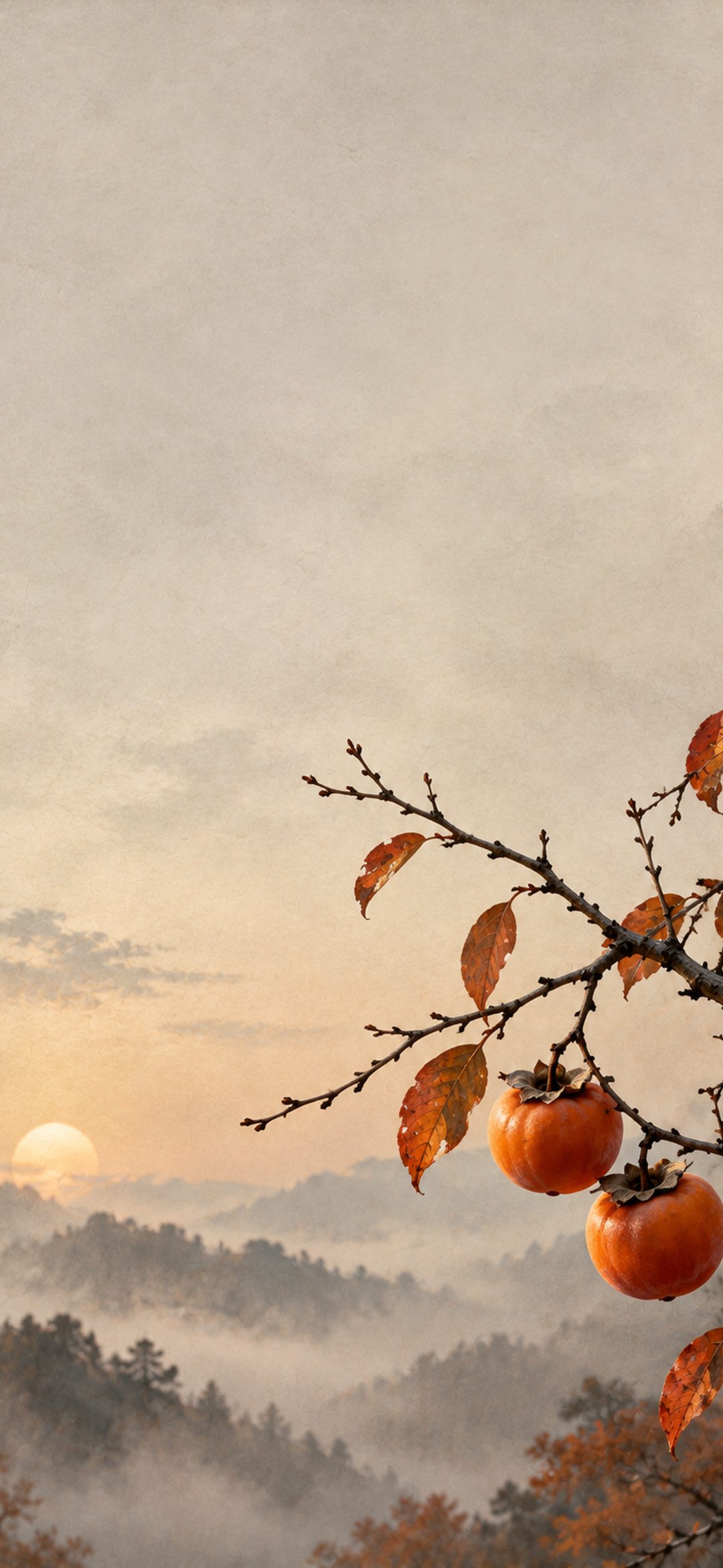 Two ripe orange persimmons hanging from a bare branch with autumn leaves against a pale misty mountain landscape