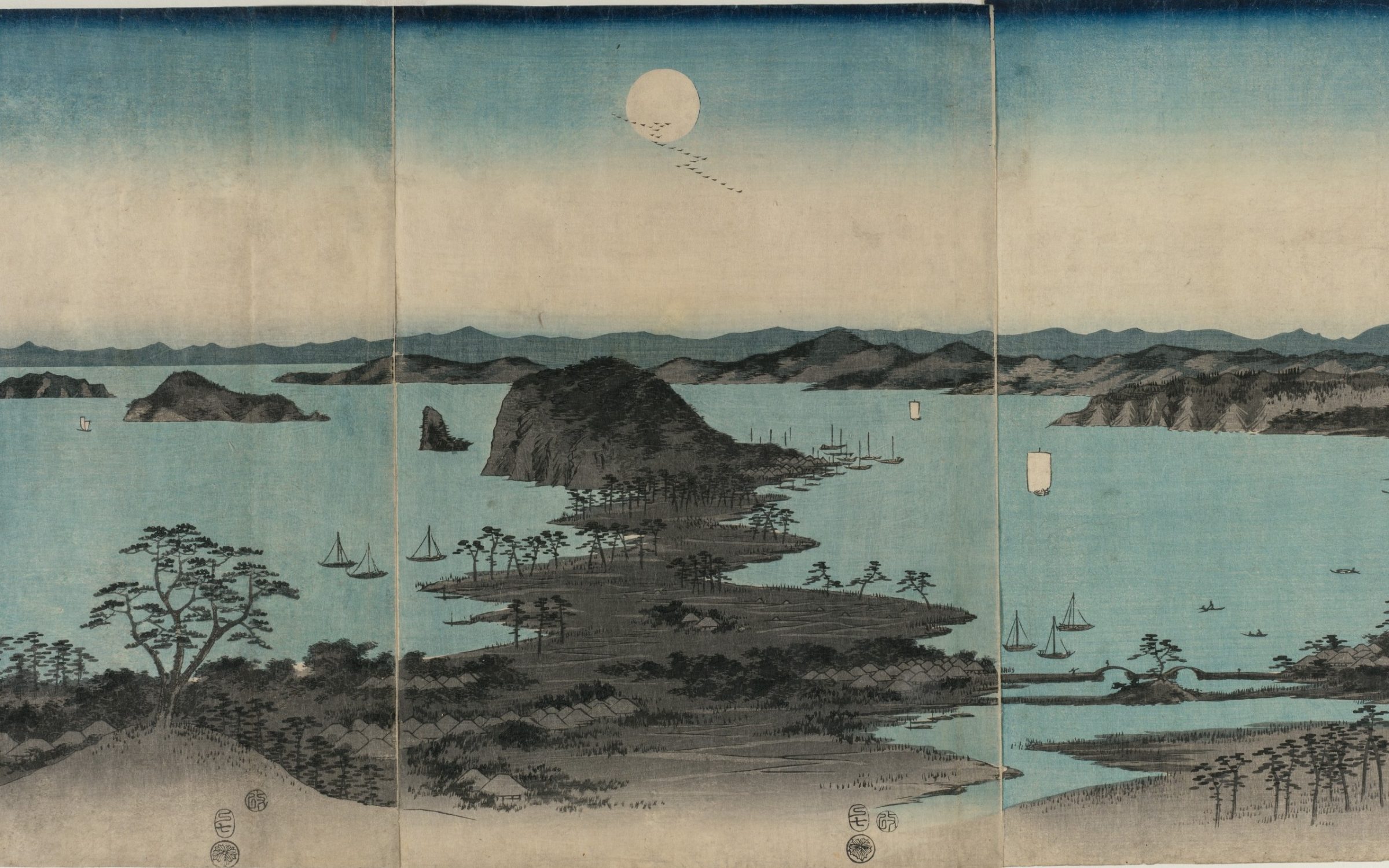 Full moon over a calm bay with small pine islands and boats
