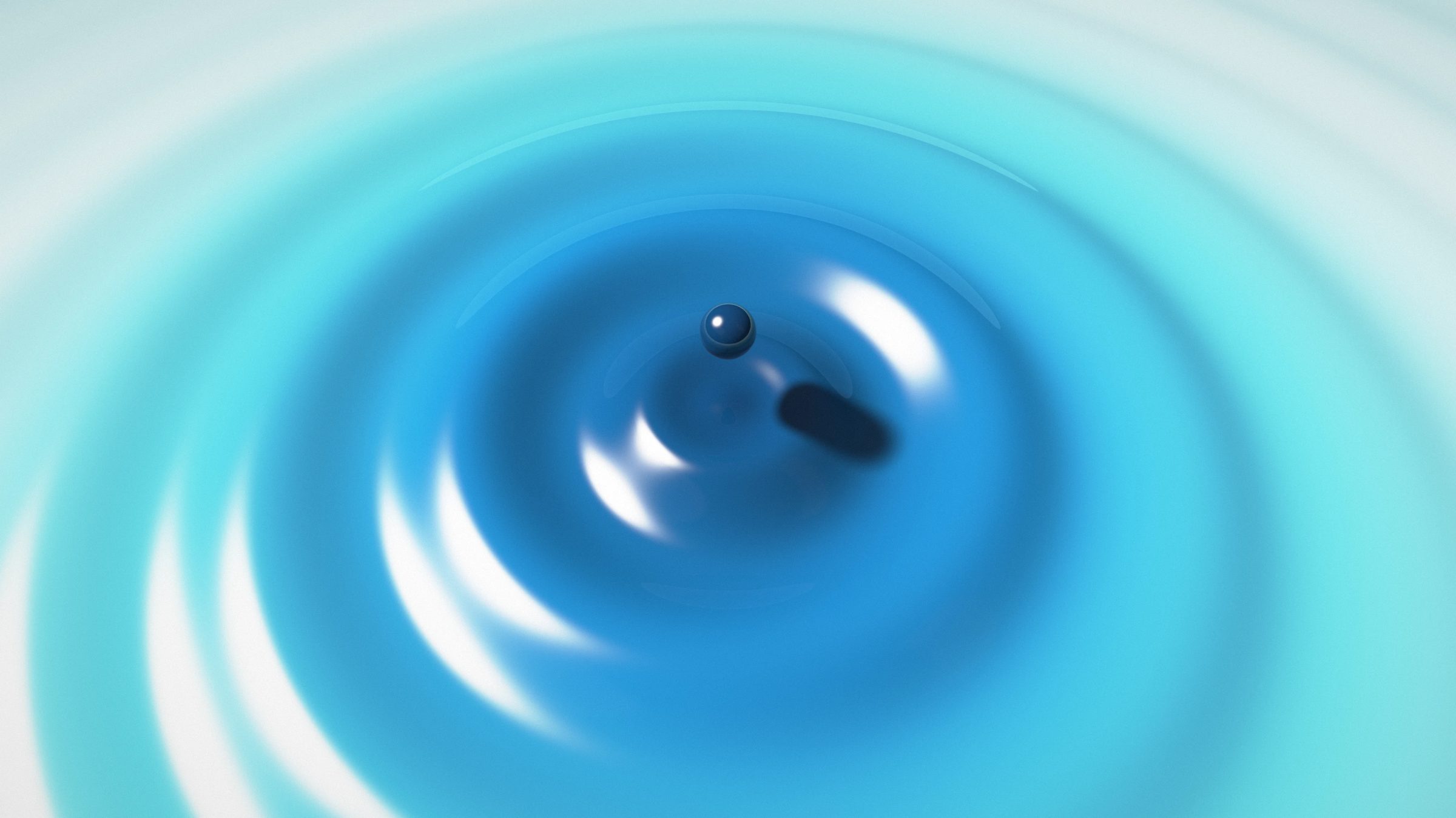 Ocean Drop Ripples: a blue droplet hangs above rings of glossy ripples spreading out from the centre, from deep ocean blue to pale aqua, PC wallpaper
