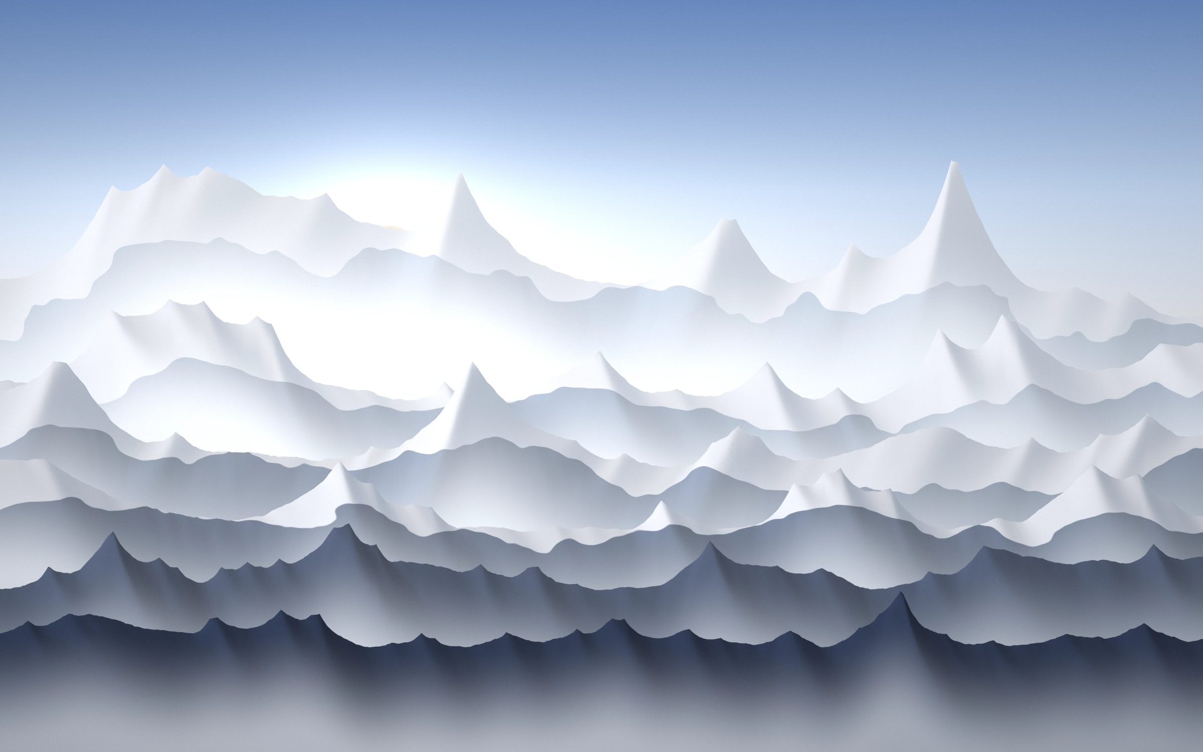 Polar Summit Light: brilliant snowfields cover a long chain of peaks under a cold blue sky, with soft pink light gathering around the low sun, Mac wallpaper