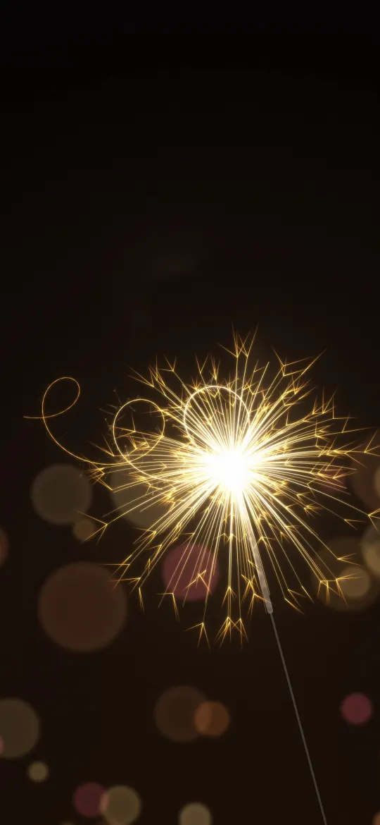 Sparkler Light Trail: a glowing sparkler sprays hundreds of golden sparks and draws a looping light trail in front of warm bokeh, iPhone wallpaper