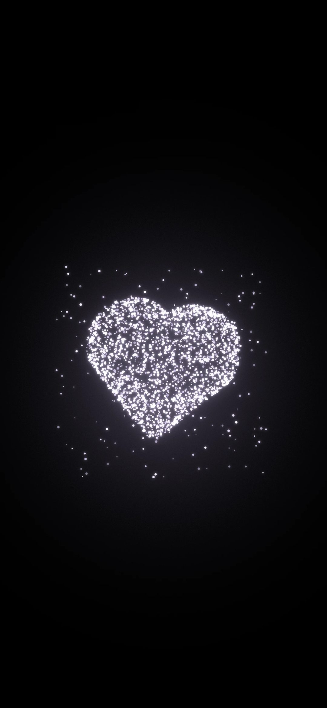 Stardust Violet Heart: a heart made of tiny glowing lilac-white dust particles floats in a faint violet haze on black, iPhone wallpaper