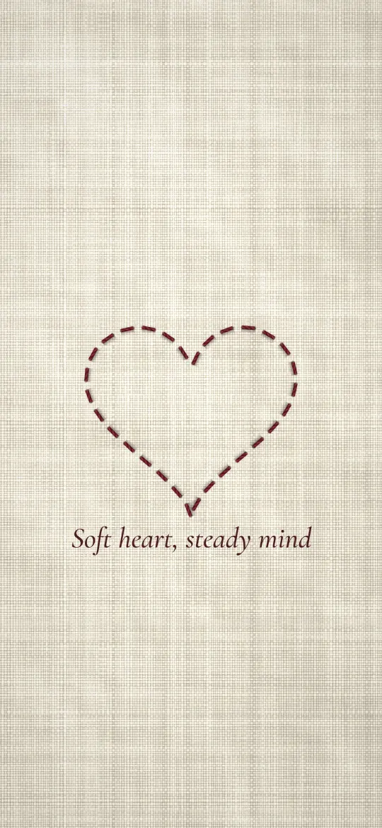 Stitched Thread Heart: a heart stitched in red thread sits on oatmeal linen above the line "Soft heart, steady mind", iPhone wallpaper