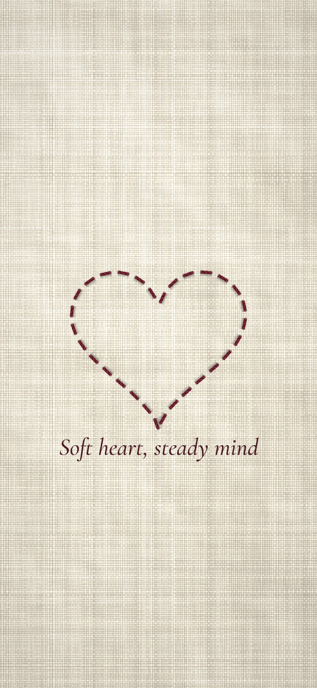 Stitched Thread Heart: a heart stitched in red thread sits on oatmeal linen above the line "Soft heart, steady mind", iPhone wallpaper