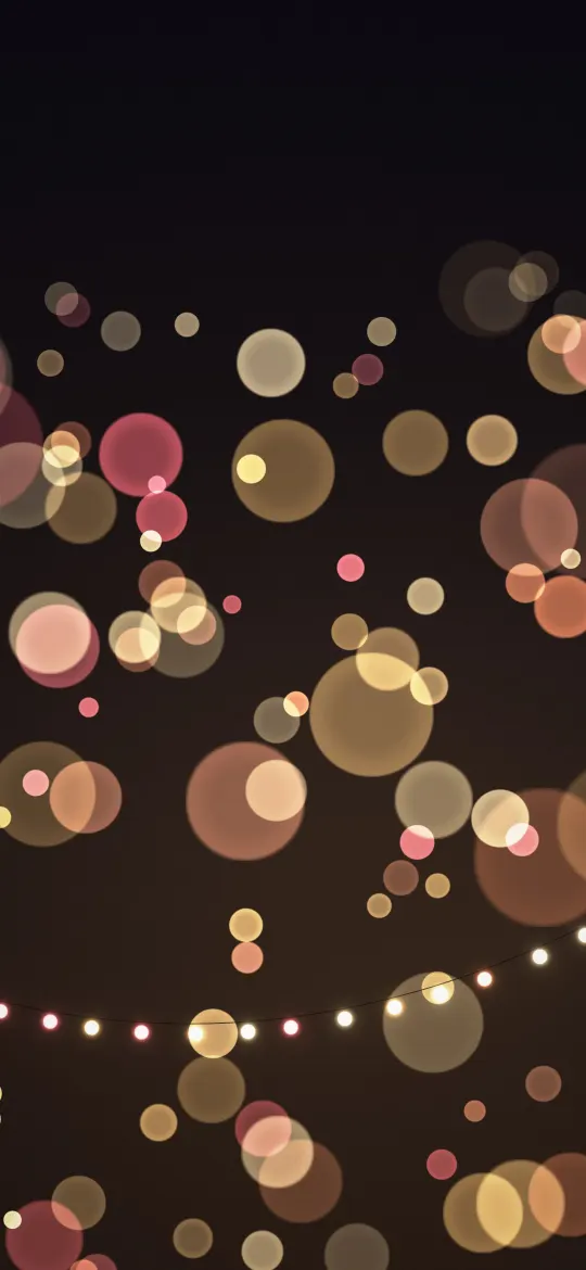 Warm Fairy Lights: a string of tiny warm bulbs loops across the lower half while soft gold, peach and rose light circles glow out of focus on a dark brown night, iPhone wallpaper