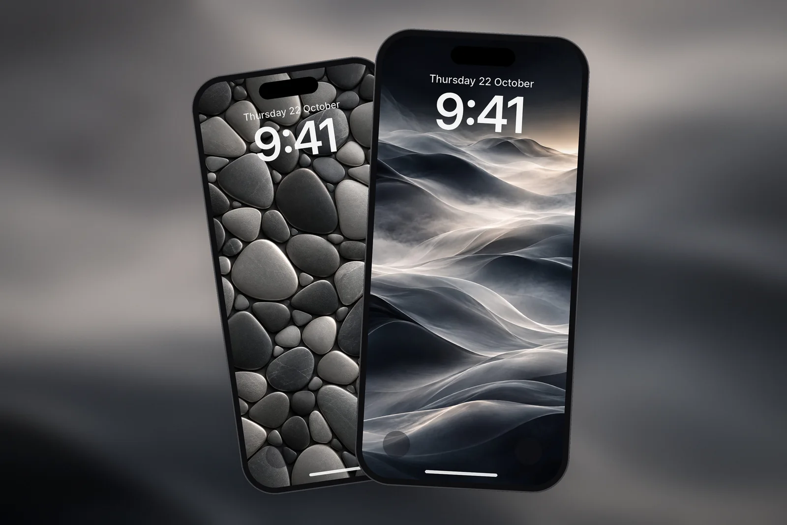 A phone Lock Screen showing the Minimal Fog wallpaper, with a second phone showing the Graphite Pebble wallpaper behind it