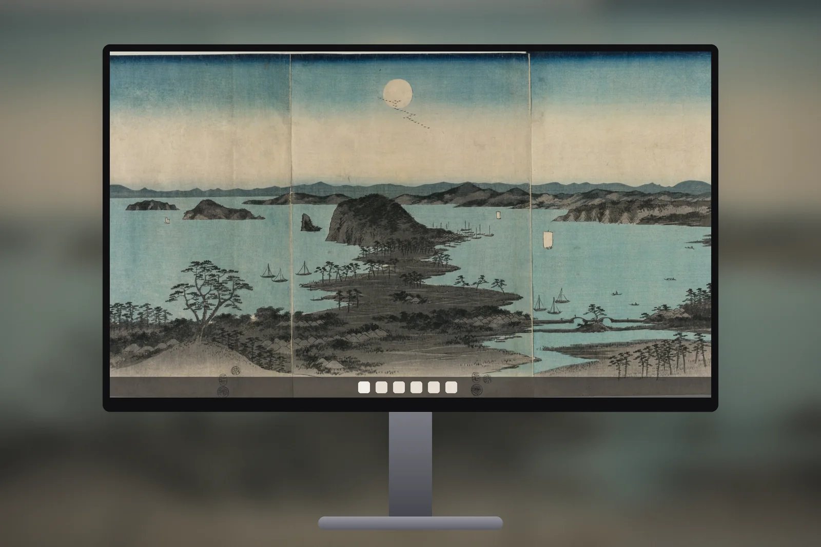 A desktop monitor showing the Moonlit Bay Islands wallpaper